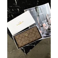 Женский кошелек Coach персиковий на много отделений большой Коуч